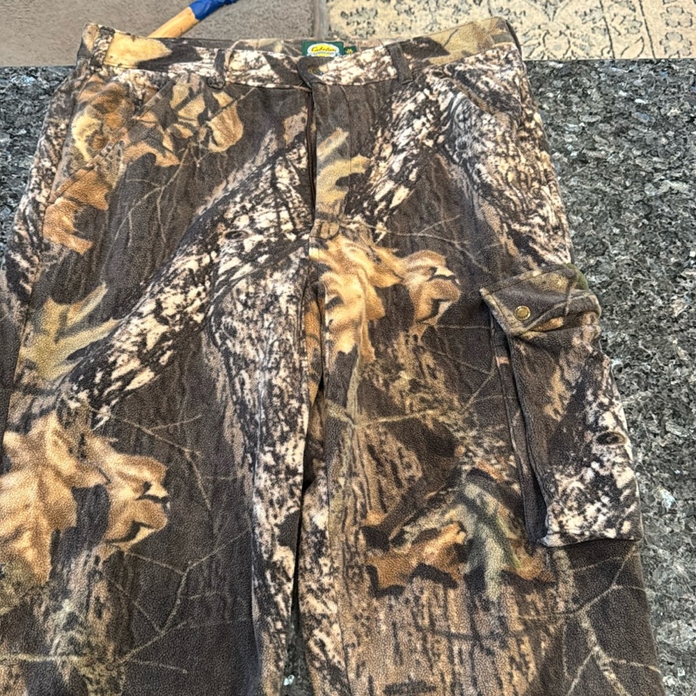 Cabelas lined fleece hunting pants size 38 unhemmed. Camouflage. Camo